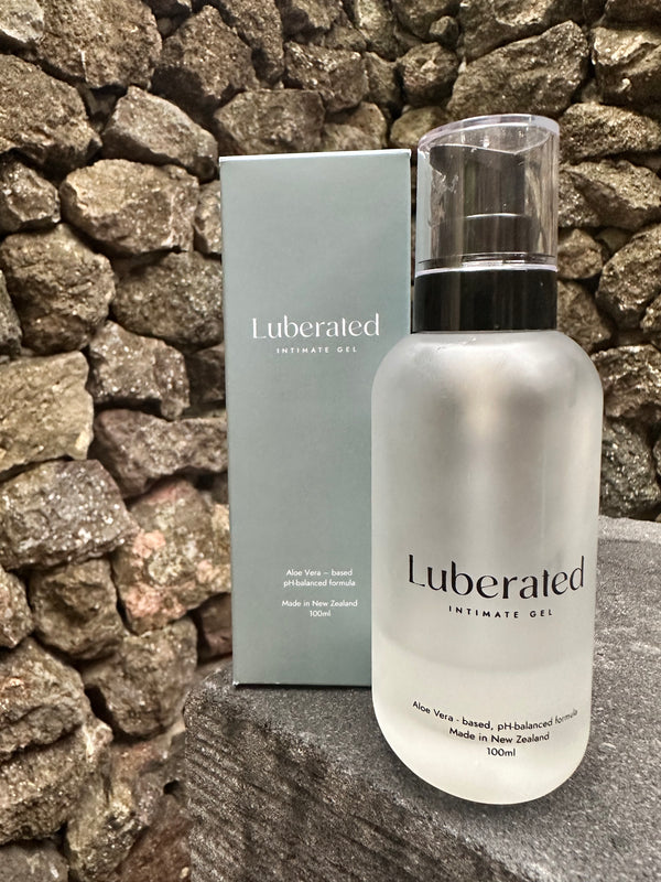 A bottle next to a box of Luberated aloe lubricant